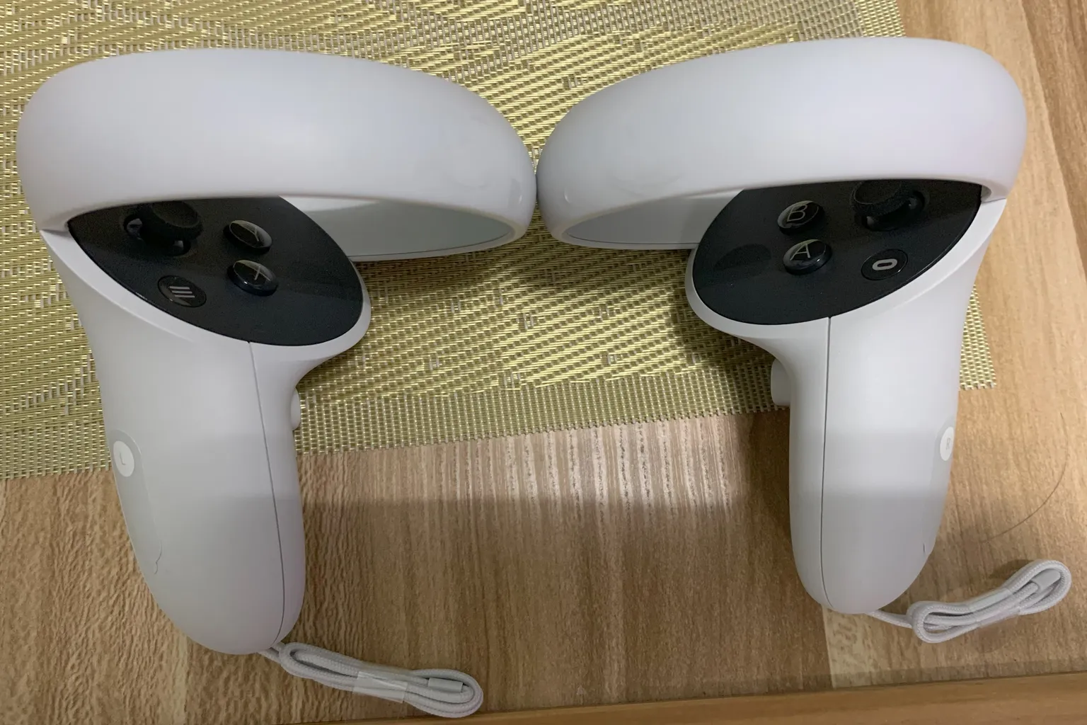 Touch Plus controllers included with the refurbished Meta Quest 2 replacement. The controllers appear clean and free of visible scratches.