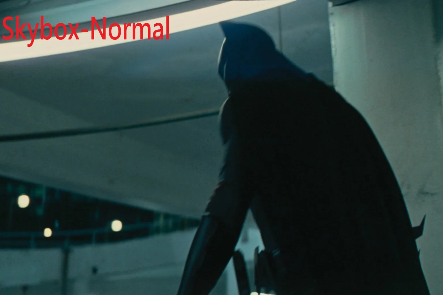 Playing The Dark Knight (2008) in SKYBOX normal mode, with a greenish-blue color bias and natural brightness gradation, though the color shift is somewhat noticeable.