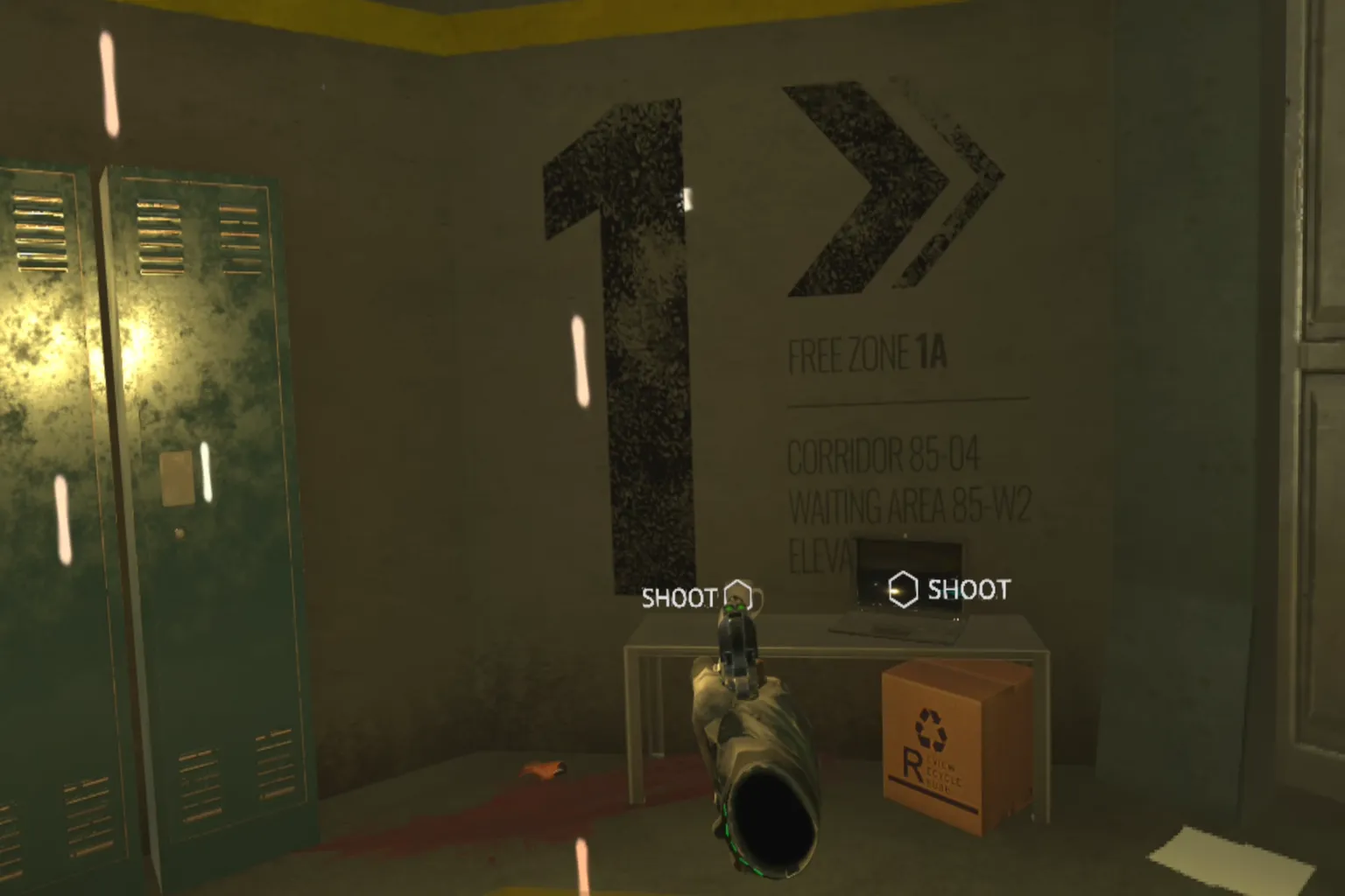 The player aiming a handgun at a laptop and wall ahead, while a shooting tutorial message appears on the screen.