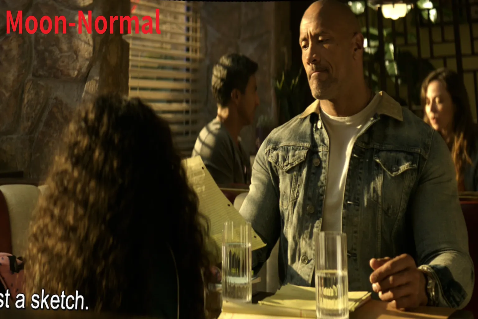 Video image with strong yellow and warm tones, creating a sunset-like atmosphere, with sharp contrast and strong depth in characters, and clear details in denim fabric and glass, though skin tones appear slightly yellow and oversaturated.