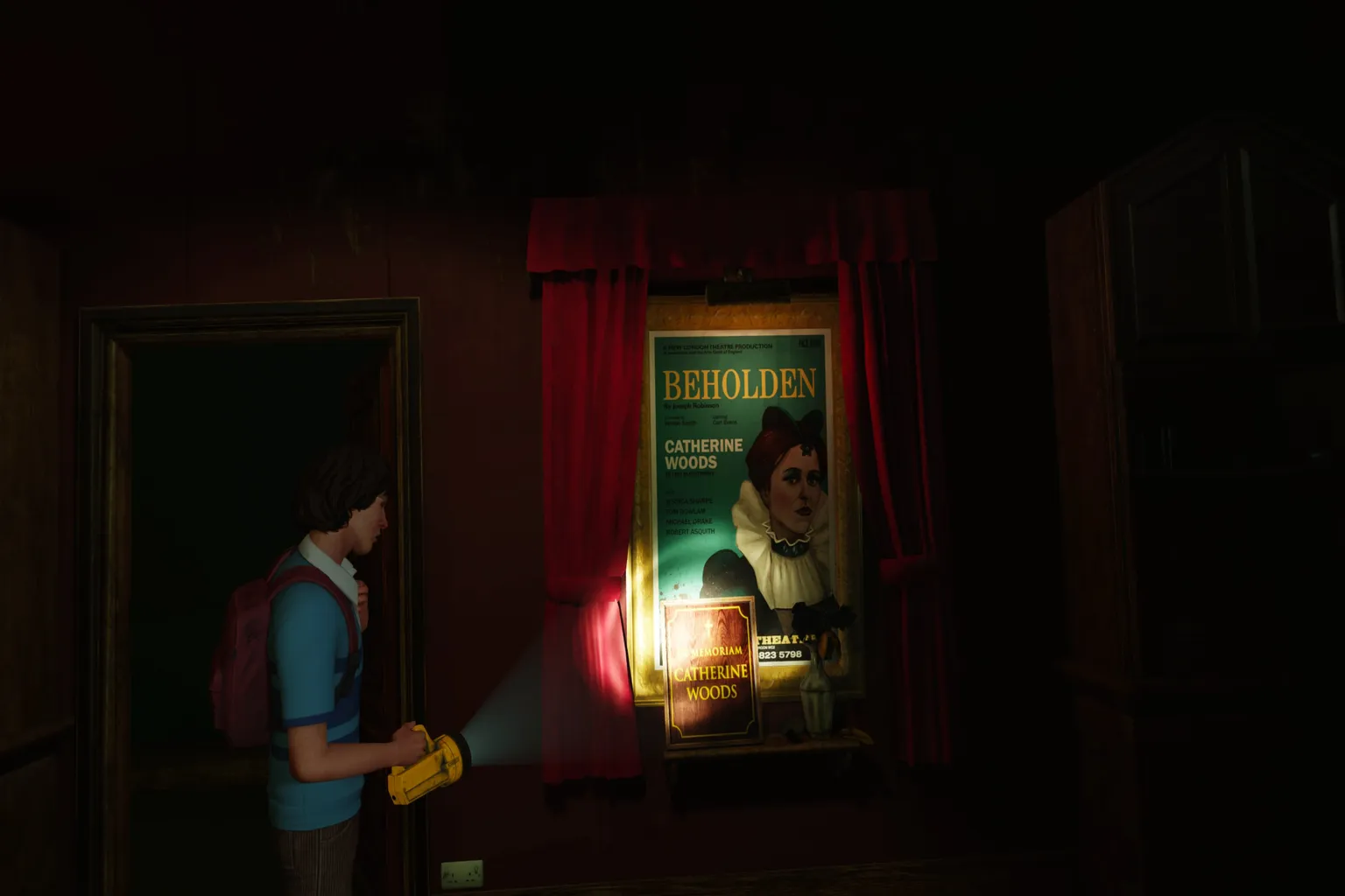 Hallway poster in Ghost Town illuminated by a flashlight, showing a memorial tribute to actress Catherine Woods.