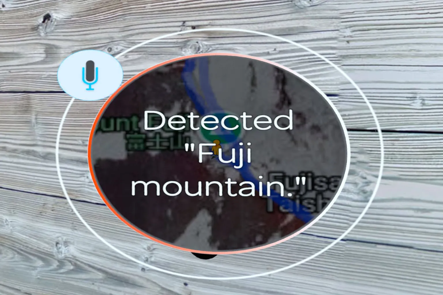 Voice search screen recognizing “Mount Fuji,” with a mountain trail and summit scenery visible in the background.