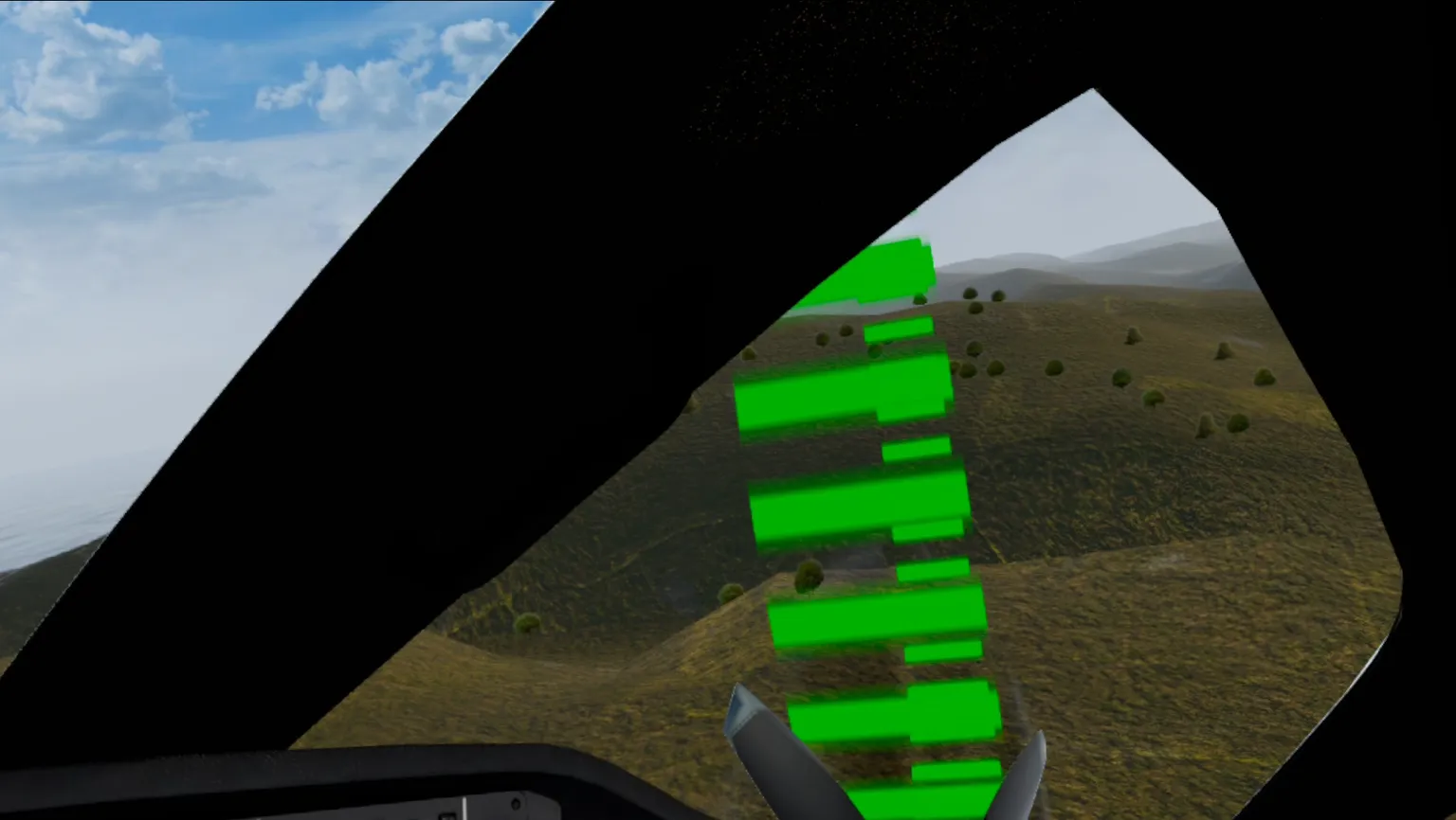 ゲーム内では緑色のガイドリングを空中で通過し、フライト操作の練習を行うシーン。
