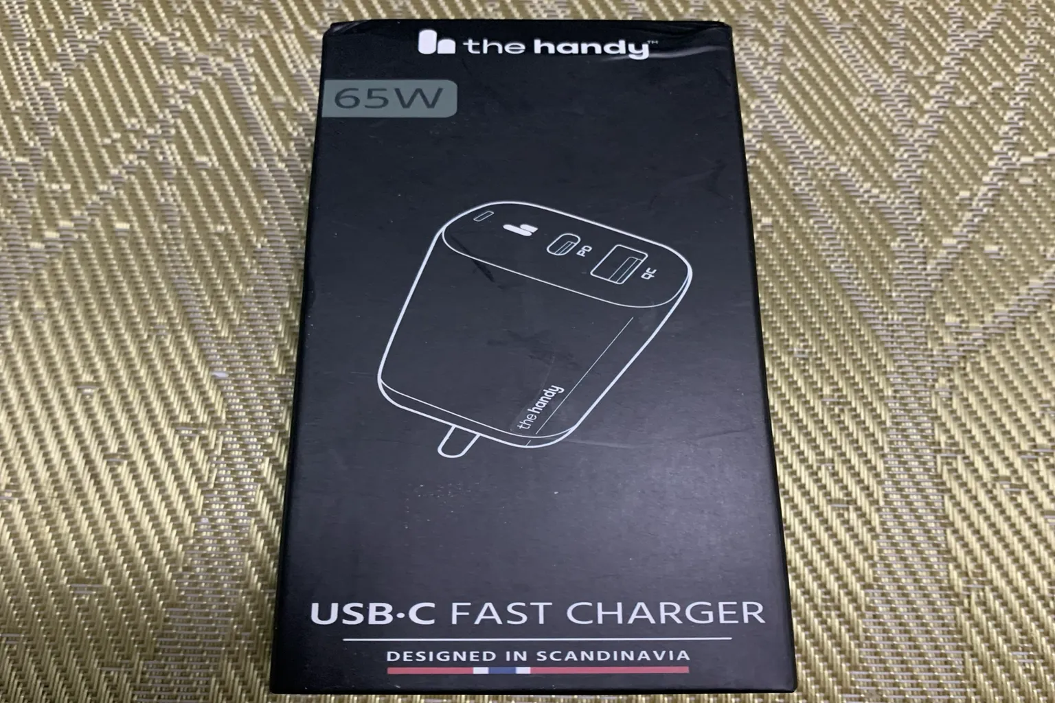 The Handy 65W USB-C 快速充電器外盒,支援 PD 與 QC 快充。